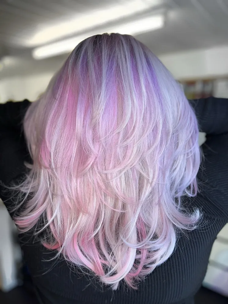 Pastel lilac layers — Soft lilac and pink over a lifted base, cut into long layers